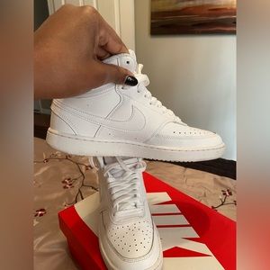 All white Nike Court Vision